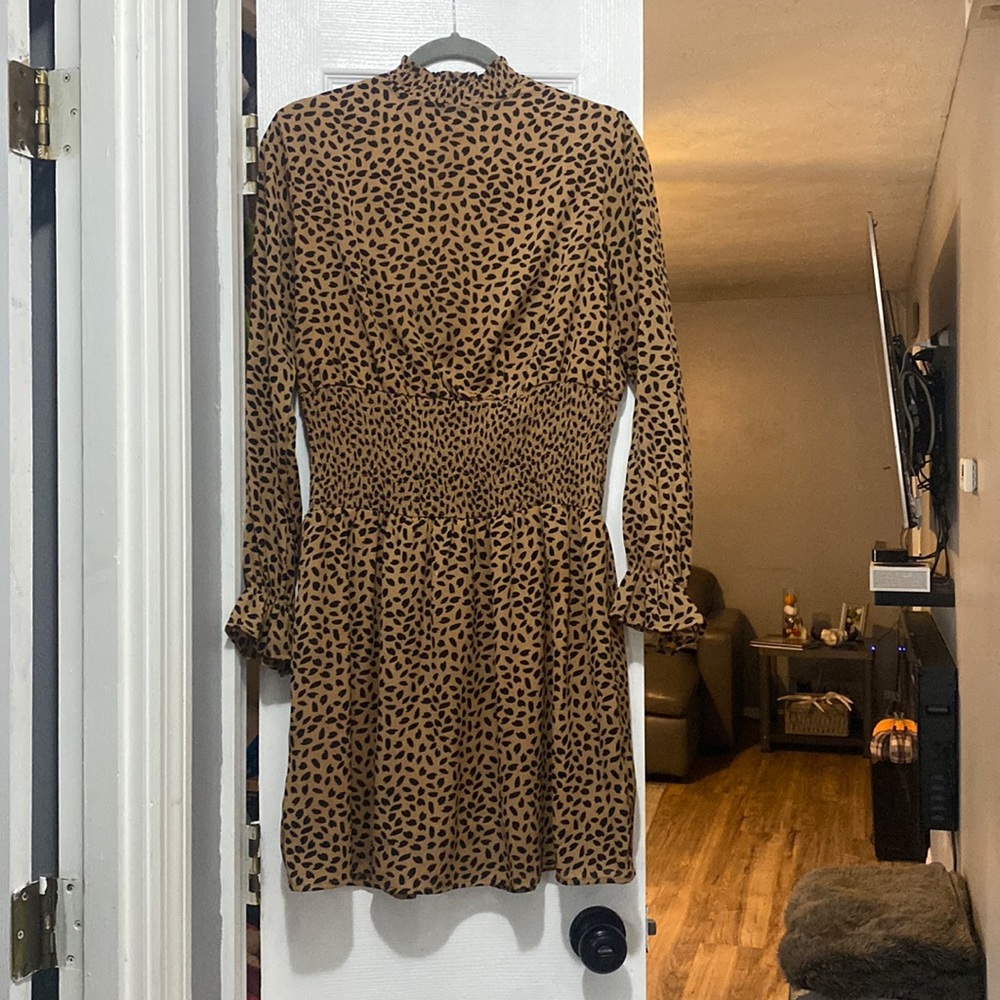 Black and tan pattern dress